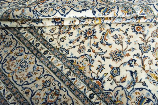 Close-up detail of New Kashan rug from Iran / Persia showing Wool weave
