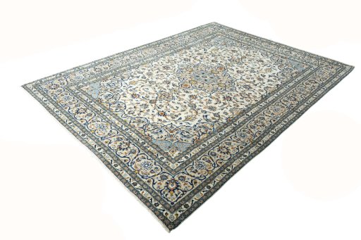 Corner detail of New Kashan rug showing border pattern and Wool pile