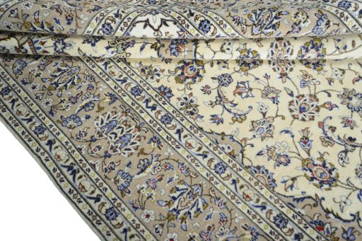 Close-up detail of New Kashan rug from Iran / Persia showing Wool weave