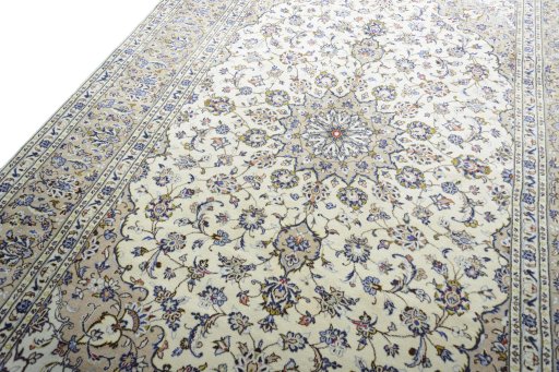Backside of handmade New Kashan rug showing knot structure and weave density