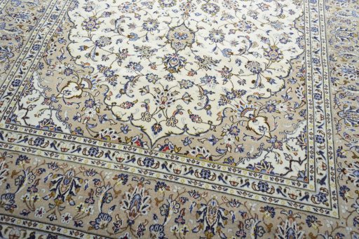 Close-up detail of New Kashan rug from Iran / Persia showing Wool weave