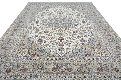 Surface texture of 2000s Kashan rug with natural Wool and intricate pattern