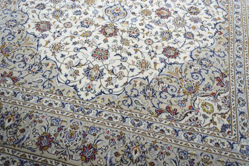 Close-up detail of 2000s Kashan rug from Iran / Persia showing Wool weave