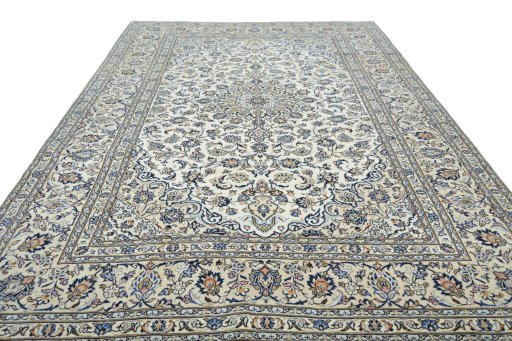 Surface texture of 2000s Kashan rug with natural Wool and intricate pattern