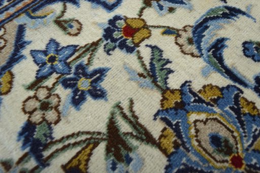 Close-up detail of 2000s Kashan rug from Iran / Persia showing Wool weave