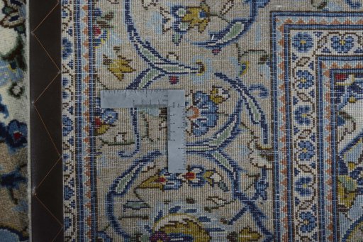Central medallion detail of 2000s Kashan rug from Iran / Persia