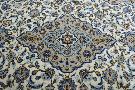 Central medallion detail of 2000s Kashan rug from Iran / Persia