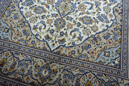 Close-up detail of 2000s Kashan rug from Iran / Persia showing Wool weave