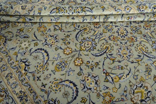 Close-up detail of 2000s Kashan rug from Iran / Persia showing Wool weave