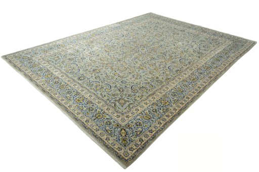 Corner detail of 2000s Kashan rug showing border pattern and Wool pile