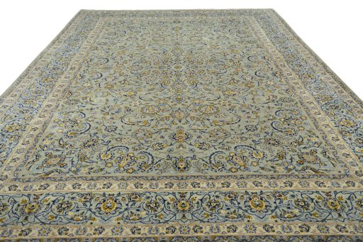 Surface texture of 2000s Kashan rug with natural Wool and intricate pattern