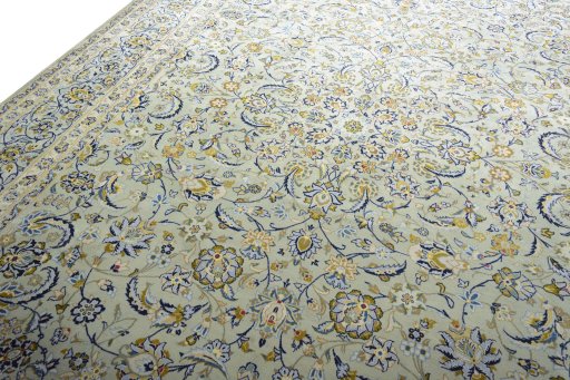Backside of handmade 2000s Kashan rug showing knot structure and weave density