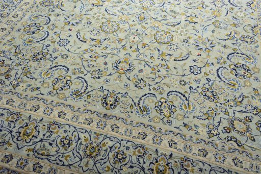 Close-up detail of 2000s Kashan rug from Iran / Persia showing Wool weave