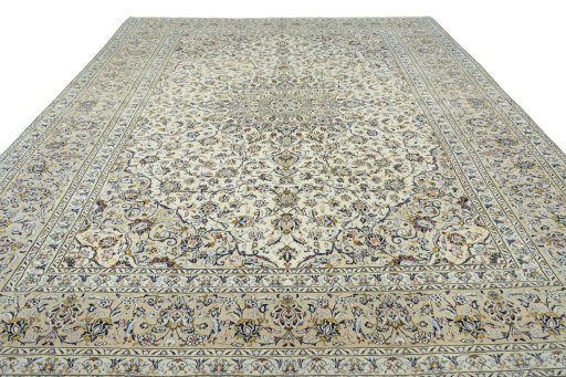 Surface texture of 2000s Kashan rug with natural Wool and intricate pattern