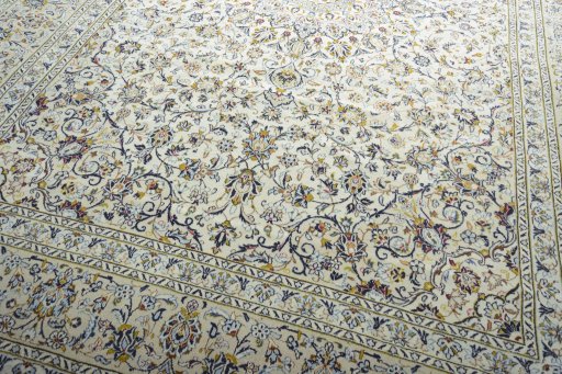 Close-up detail of 2000s Kashan rug from Iran / Persia showing Wool weave