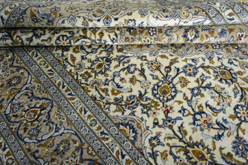 Close-up detail of 2000s Kashan rug from Iran / Persia showing Wool weave