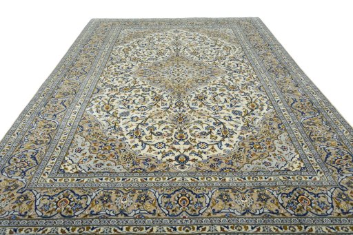 Surface texture of 2000s Kashan rug with natural Wool and intricate pattern