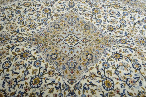 Central medallion detail of 2000s Kashan rug from Iran / Persia