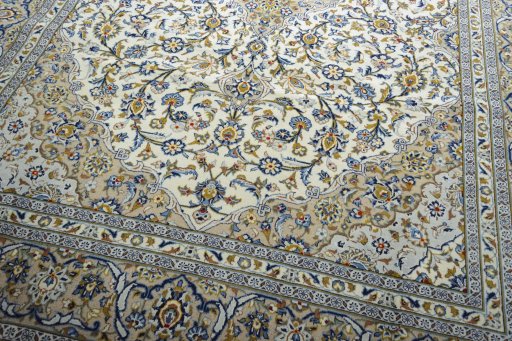 Close-up detail of 2000s Kashan rug from Iran / Persia showing Wool weave