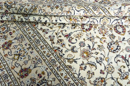 Close-up detail of 2000s Kashan rug from Iran / Persia showing Wool weave