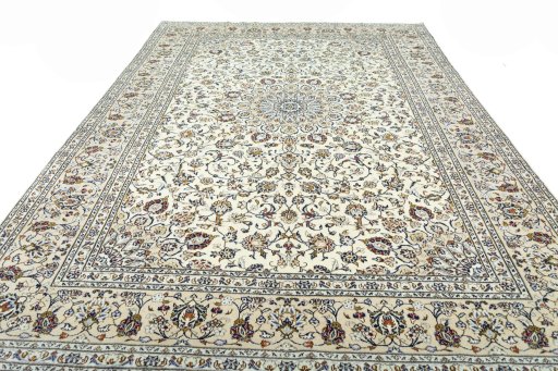 Surface texture of 2000s Kashan rug with natural Wool and intricate pattern