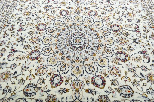 Central medallion detail of 2000s Kashan rug from Iran / Persia