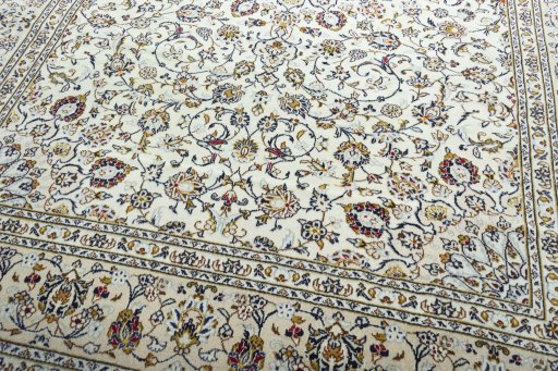 Close-up detail of 2000s Kashan rug from Iran / Persia showing Wool weave