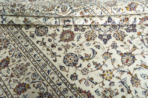 Close-up detail of 2000s Kashan rug from Iran / Persia showing Wool weave