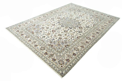 Corner detail of 2000s Kashan rug showing border pattern and Wool pile
