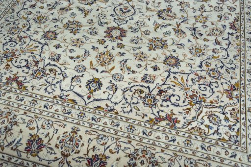 Close-up detail of 2000s Kashan rug from Iran / Persia showing Wool weave