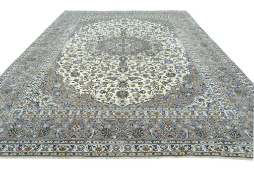 Surface texture of 2000s Kashan rug with natural Wool and intricate pattern