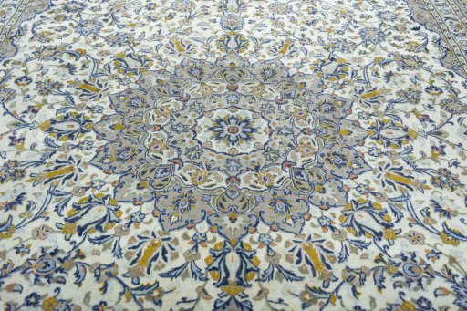Central medallion detail of 2000s Kashan rug from Iran / Persia