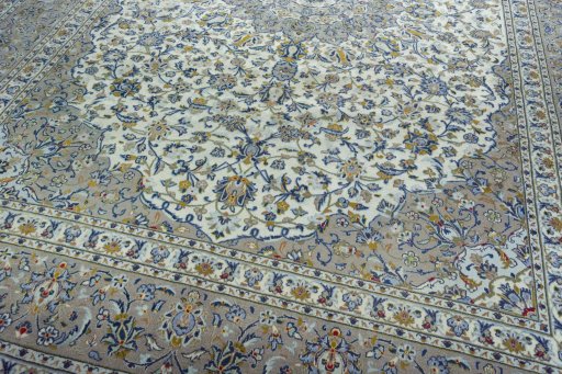Close-up detail of 2000s Kashan rug from Iran / Persia showing Wool weave