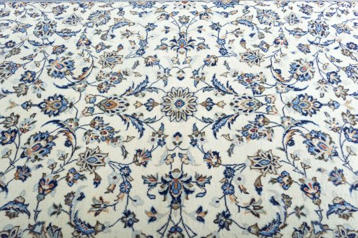 Central medallion detail of 2000s Kashan rug from Iran / Persia