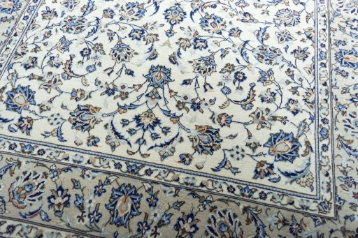 Close-up detail of 2000s Kashan rug from Iran / Persia showing Wool weave