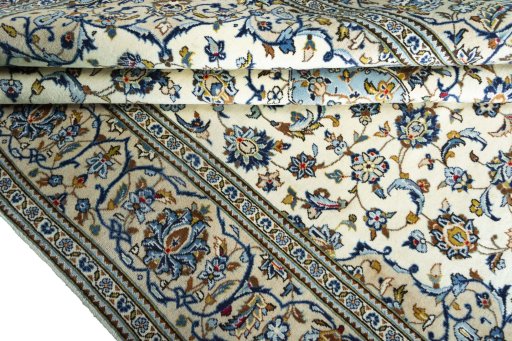 Close-up detail of New Kashan rug from Iran / Persia showing Wool weave