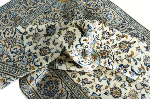 Surface texture of New Kashan rug with natural Wool and intricate pattern