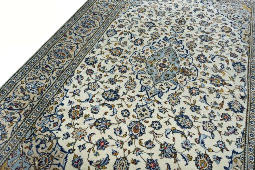 Backside of handmade New Kashan rug showing knot structure and weave density