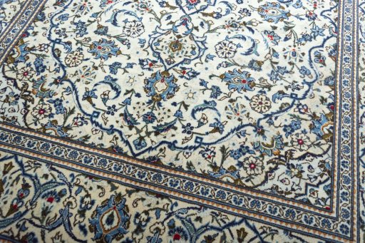 Central medallion detail of 2000s Kashan rug from Iran / Persia