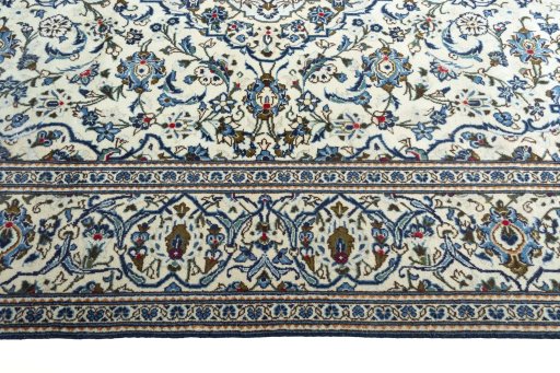 Full view of 2000s Kashan rug from Iran / Persia, 296 × 195 cm in Beige tones