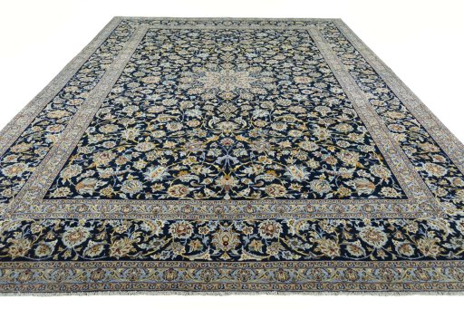 Surface texture of 2000s Kashan rug with natural Wool and intricate pattern