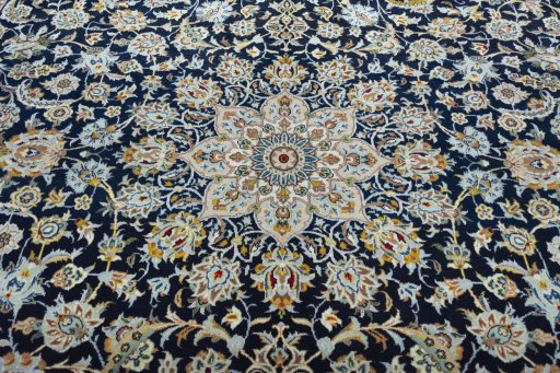 Central medallion detail of 2000s Kashan rug from Iran / Persia