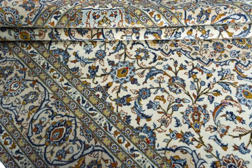 Close-up detail of 2000s Kashan rug from Iran / Persia showing Wool weave
