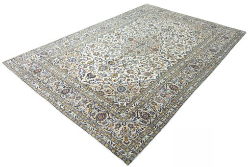Corner detail of 2000s Kashan rug showing border pattern and Wool pile