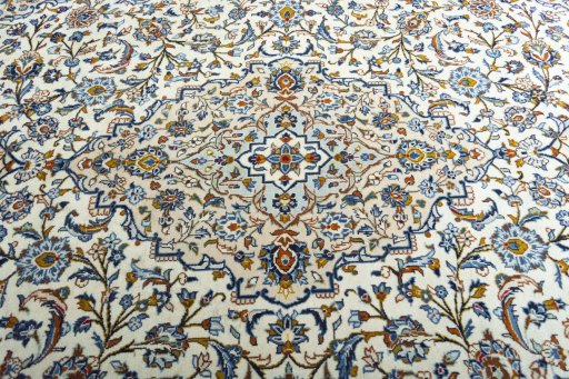 Central medallion detail of 2000s Kashan rug from Iran / Persia