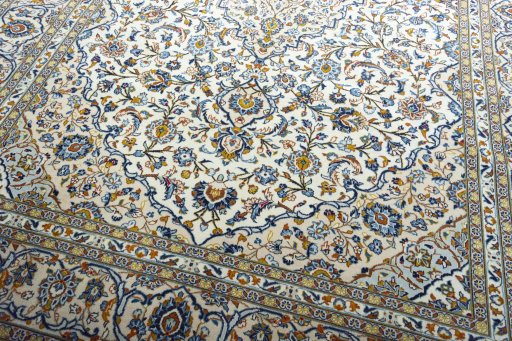 Close-up detail of 2000s Kashan rug from Iran / Persia showing Wool weave