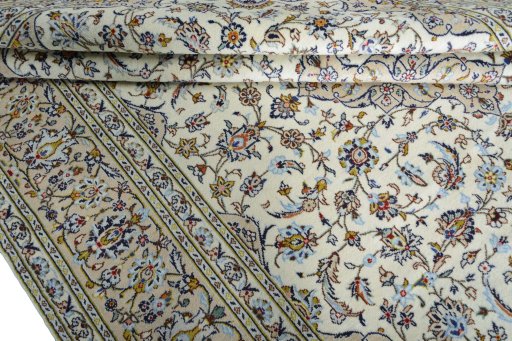 Close-up detail of 2000s Kashan rug from Iran / Persia showing Wool weave