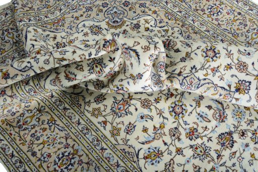 Surface texture of 2000s Kashan rug with natural Wool and intricate pattern