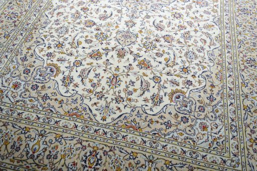 Close-up detail of 2000s Kashan rug from Iran / Persia showing Wool weave