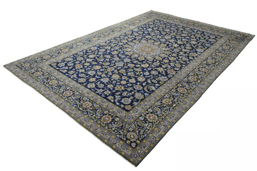Corner detail of 2000s Kashan rug showing border pattern and Wool pile